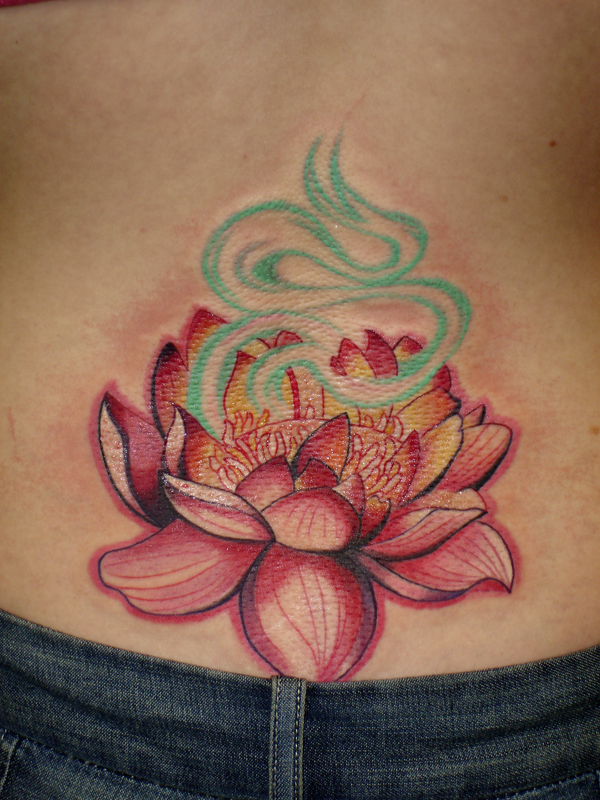 rose flower tattoo. lower back tattoo flower
